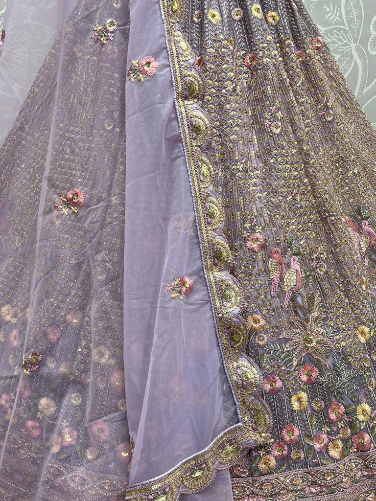 Bewitching Lavender Sequins Net Engagements Wear Lehenga Choli