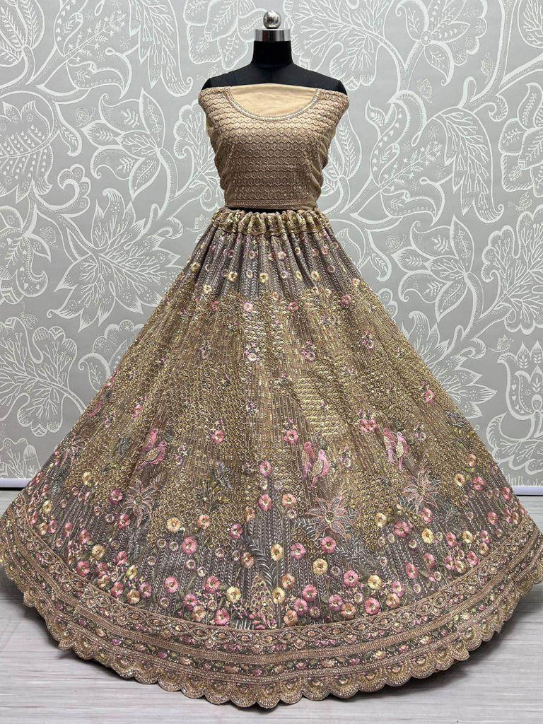 Marvelous Golden Sequins Work Net Reception Wear Lehenga Choli
