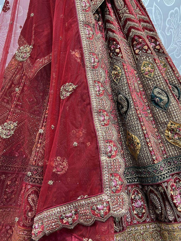 Spectacular Red Heavy Embroidered Velvet Bridal Lehenga Choli