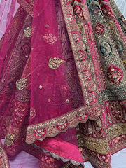 Stupendous Pink Heavy Embroidered Velvet Bridal Lehenga Choli