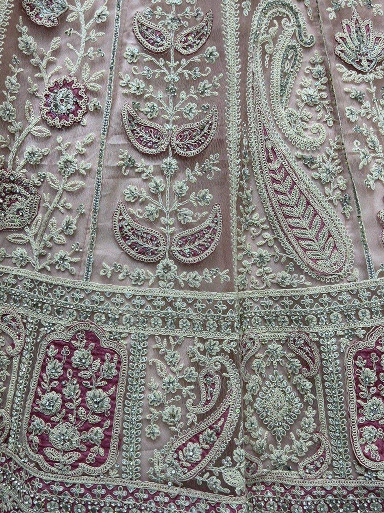 Adorable Peach Embroidered Net Engagements Wear Lehenga Choli