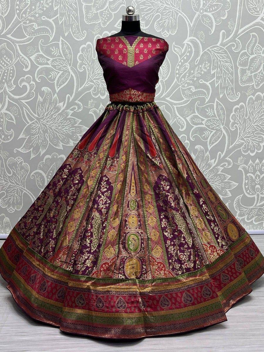 Purple and gold designer lehenga choli with intricate embroidery and peacock motifs, perfect for Indian ethnic wear.