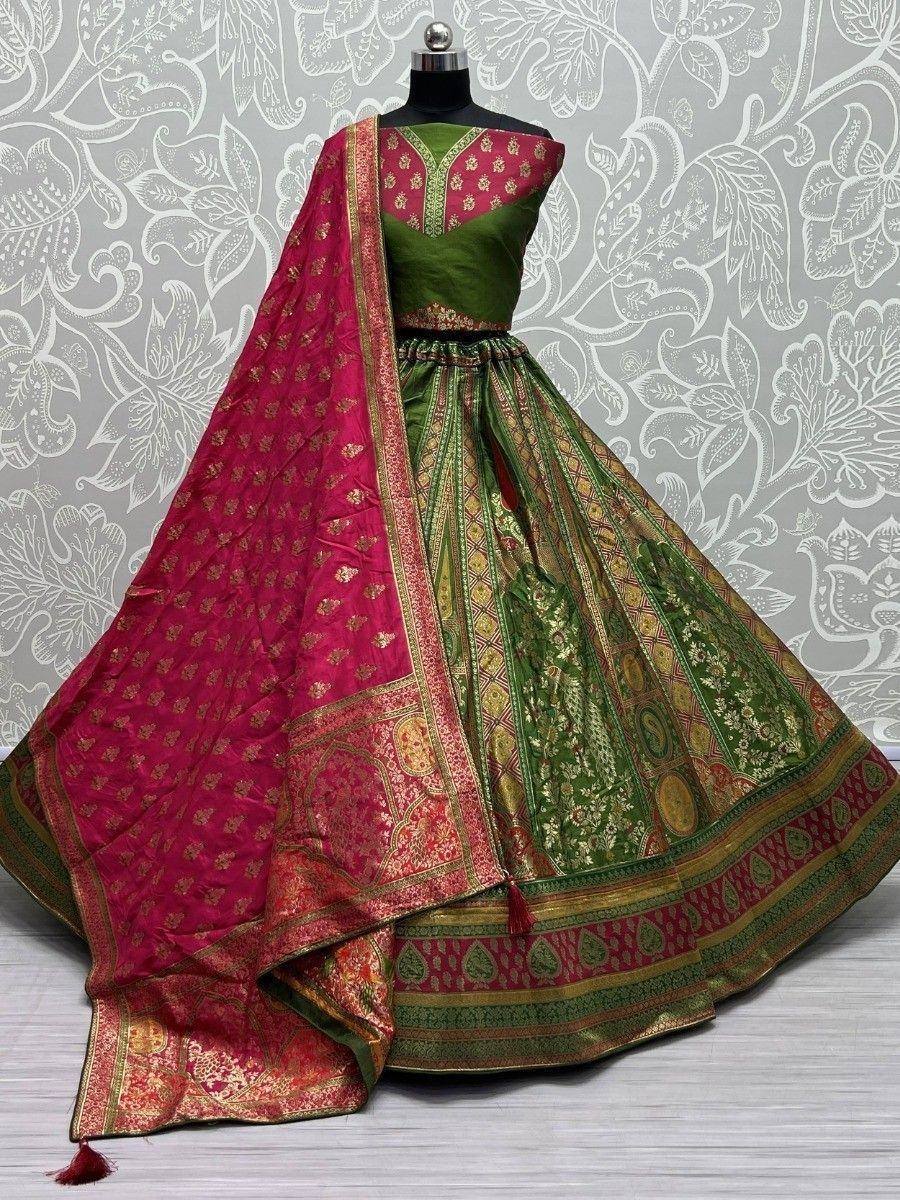 Green and pink designer lehenga choli with gold embroidery and matching dupatta, ethnic Indian wear