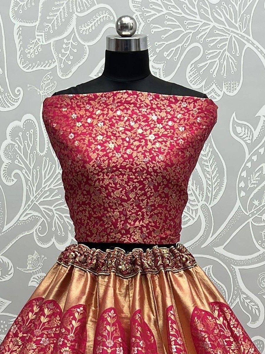 Red and gold off-shoulder lehenga choli with floral embroidery, perfect for Indian ethnic wear events