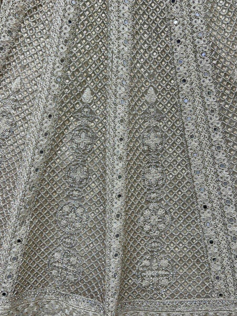 Magnetic Off-White Thread Work Net Lehenga Choli with Dupatta