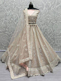 Beautiful Peach Embroidered Net Engagement Wear Lehenga Choli