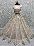 Beautiful Peach Embroidered Net Engagement Wear Lehenga Choli