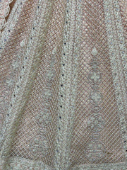 Beautiful Peach Embroidered Net Engagement Wear Lehenga Choli