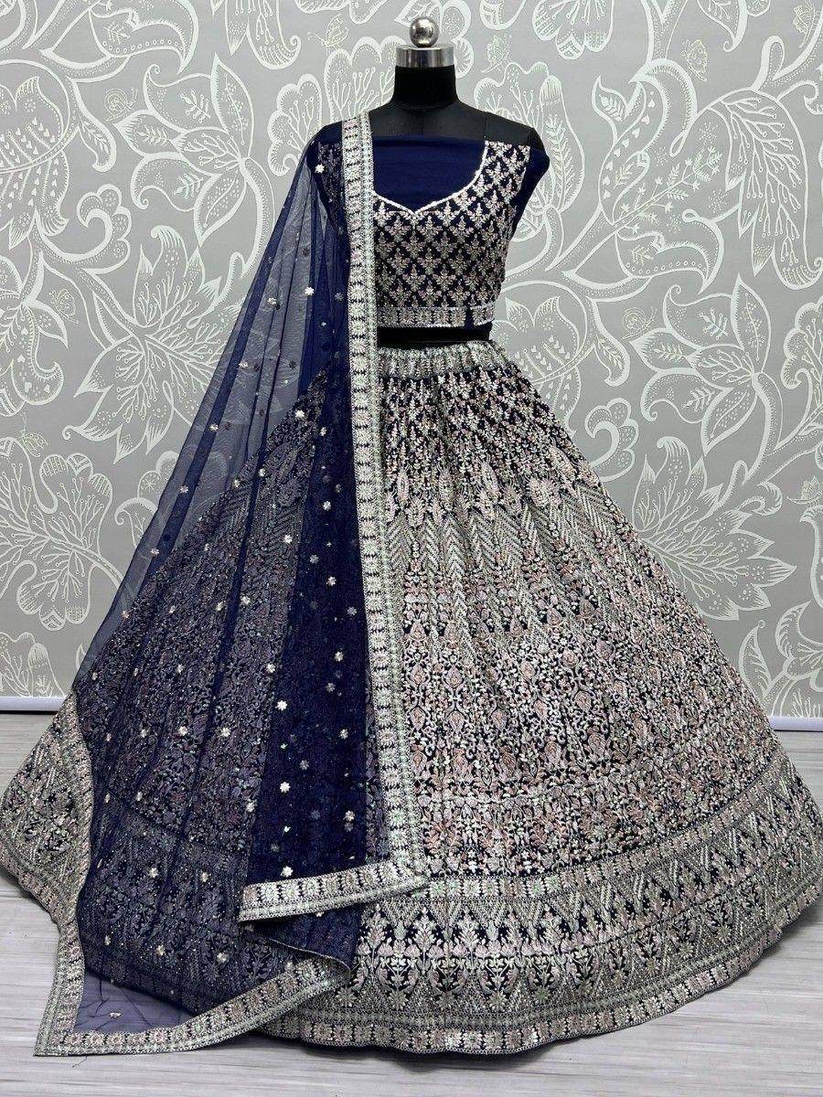 Fascinating Navy Blue Embroidered Net Reception Wear Lehenga Choli