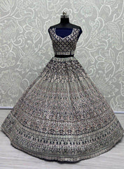 Fascinating Navy Blue Embroidered Net Reception Wear Lehenga Choli