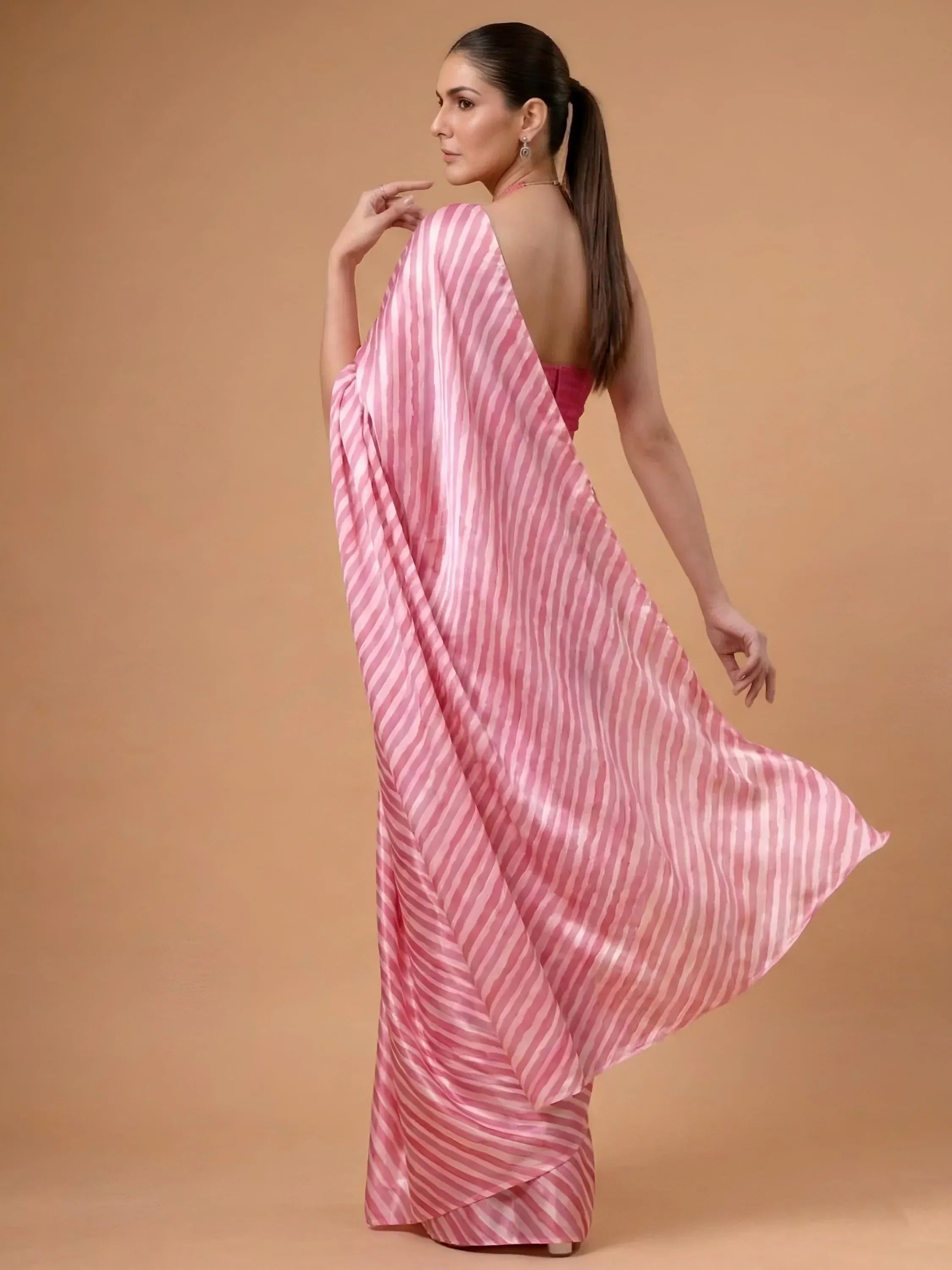 Fascinating Pink Laheriya Printed Satin Wedding Wear Saree With Blouse