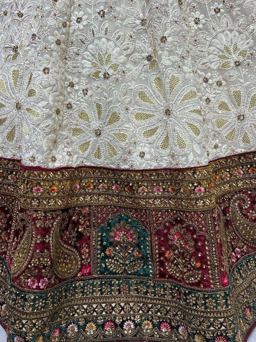 White and maroon embroidered lehenga with floral zari work and sequin detailing, perfect for Indian ethnic wear.