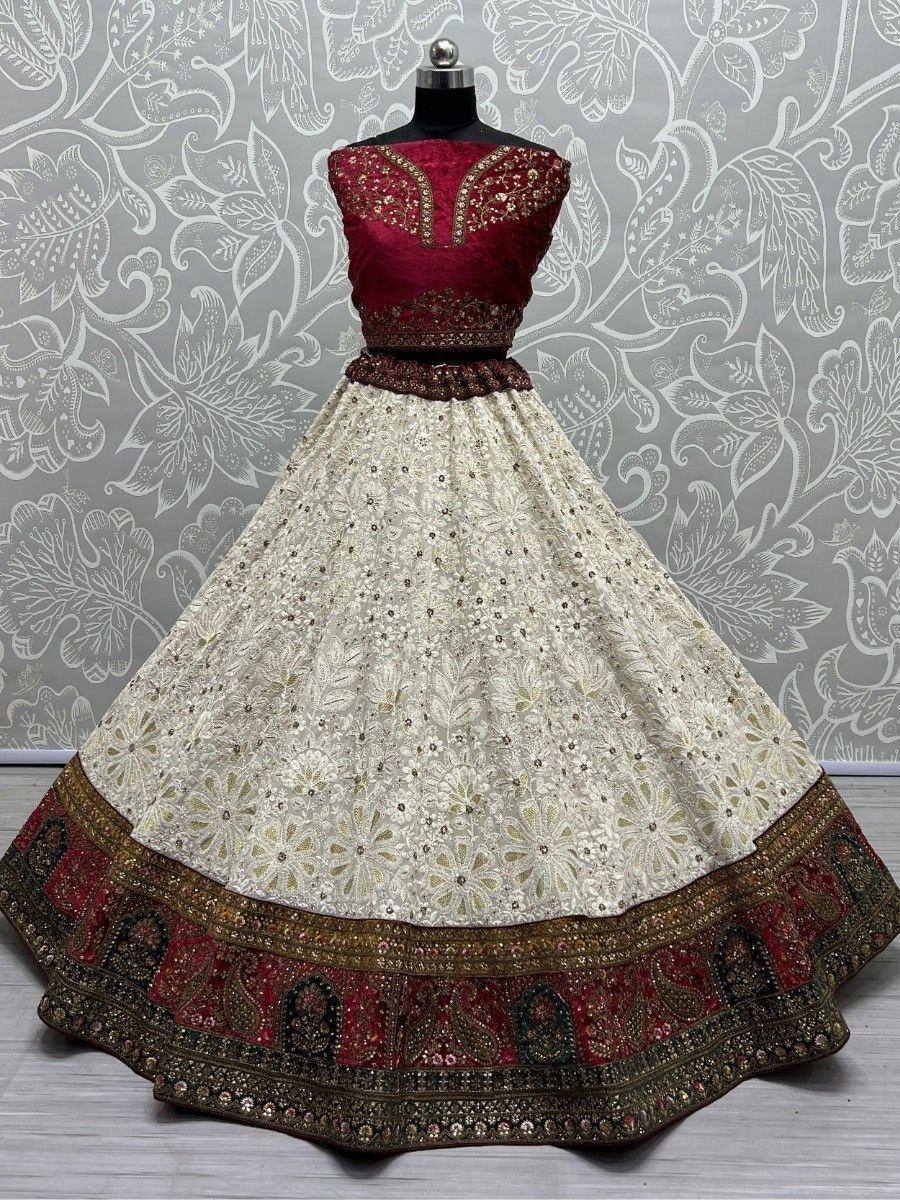 Elegant maroon and cream designer lehenga choli with intricate embroidery and embellished border