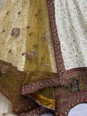 Adorable Off-White & Olive Green Embroidered Georgette Lehenga Choli