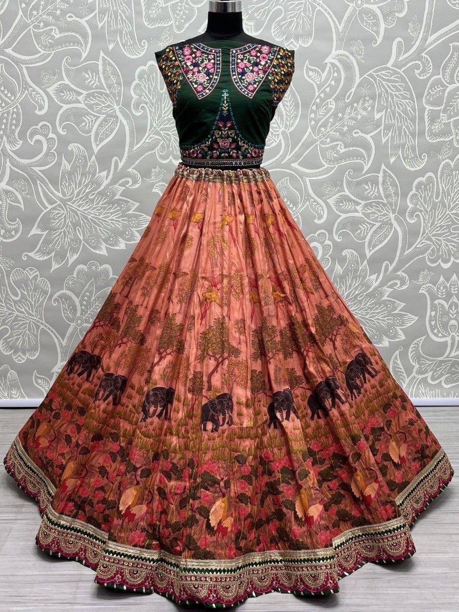 Green embroidered blouse with peach lehenga featuring elephant and floral print, Indian ethnic wear
