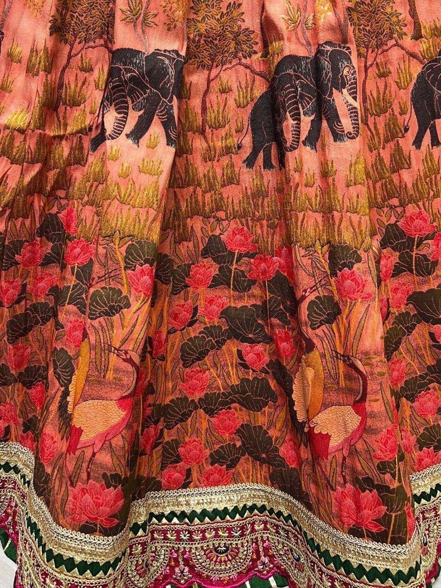 Pink ethnic lehenga with elephant, lotus, and bird print, embroidered border
