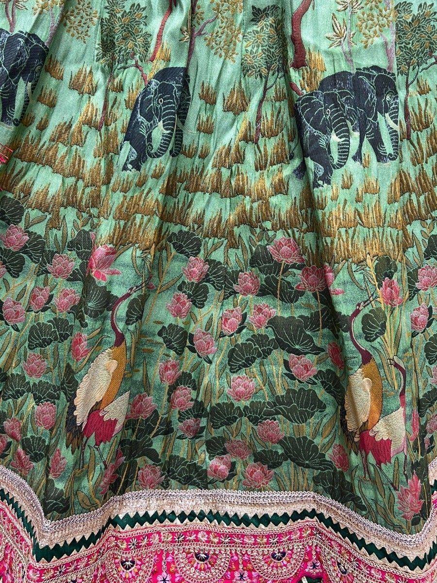 Mint green ethnic skirt with elephant, lotus, and bird print, pink embroidered border