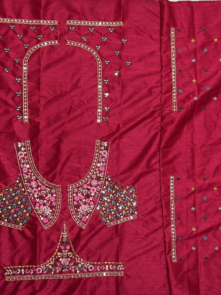 Maroon ethnic salwar kameez fabric with floral embroidery and mirror work, perfect for designer wear