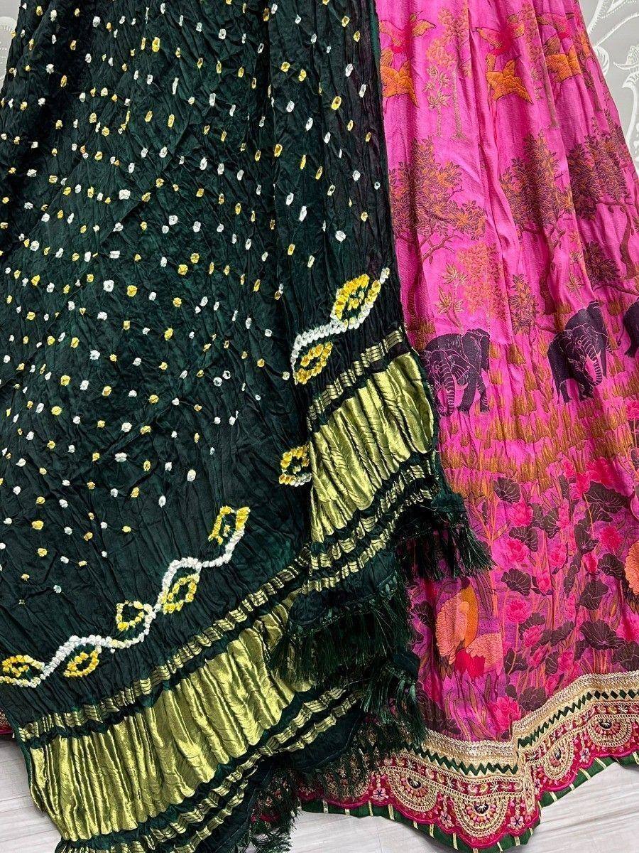 Green and pink ethnic lehenga with embroidery, tassels, and elephant print for Indian wear