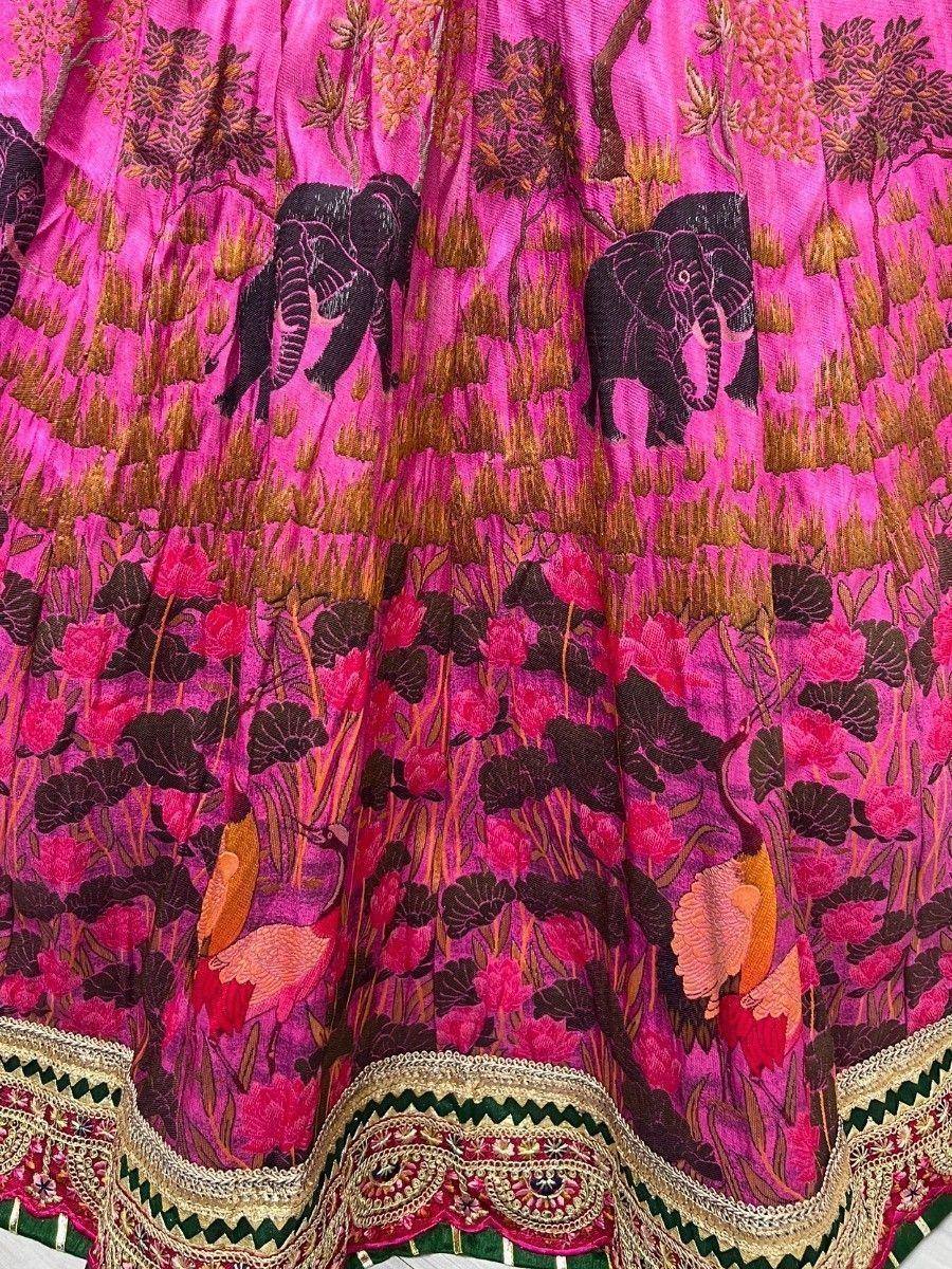 Pink ethnic lehenga with elephant and floral print, embroidered border