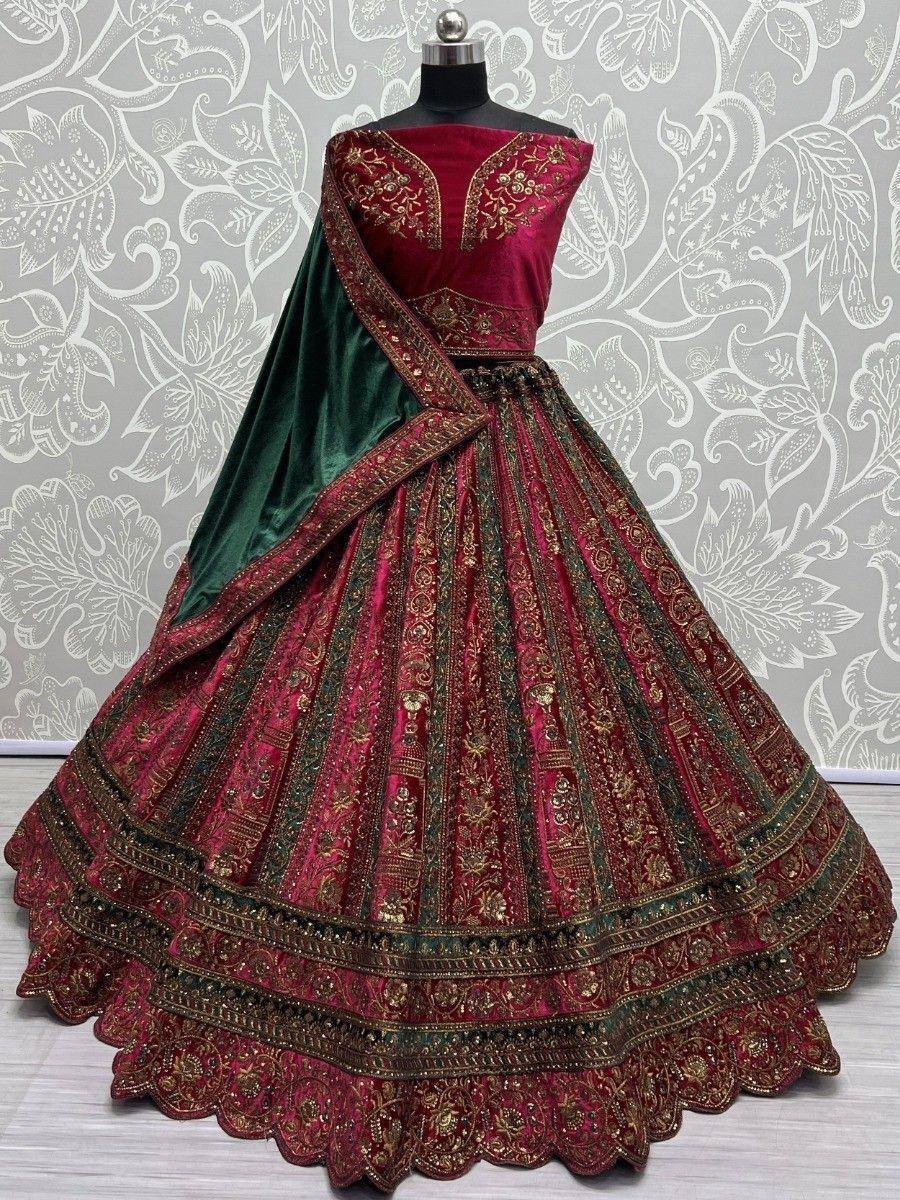 Maroon and green designer lehenga choli with gold embroidery, perfect for Indian weddings and festive occasions.