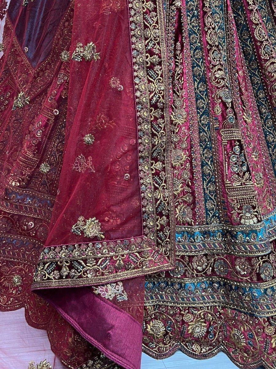 Maroon designer lehenga choli with gold embroidery and blue accents, Indian ethnic wear