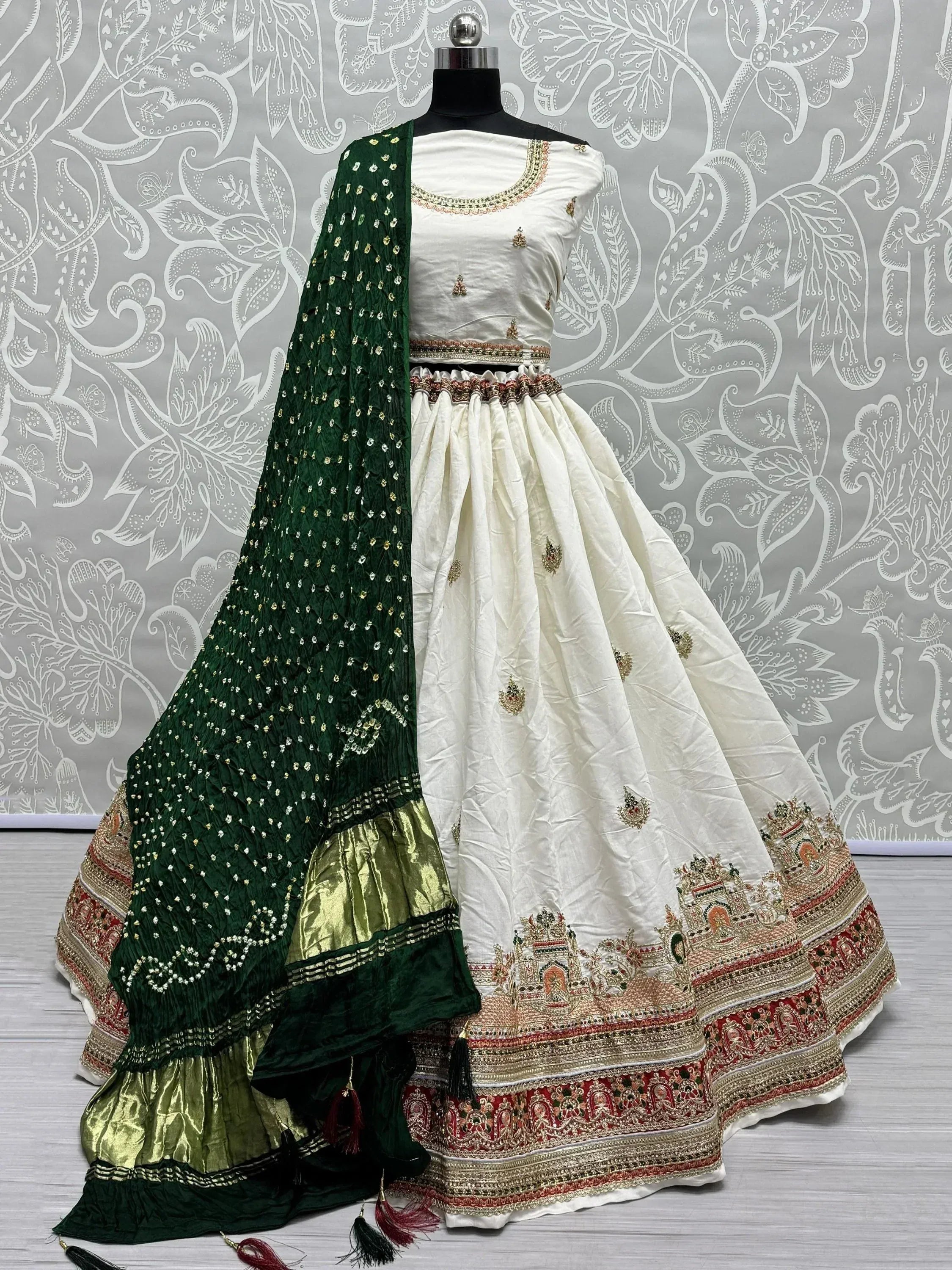 White embroidered lehenga with green dupatta, perfect for Indian ethnic wear