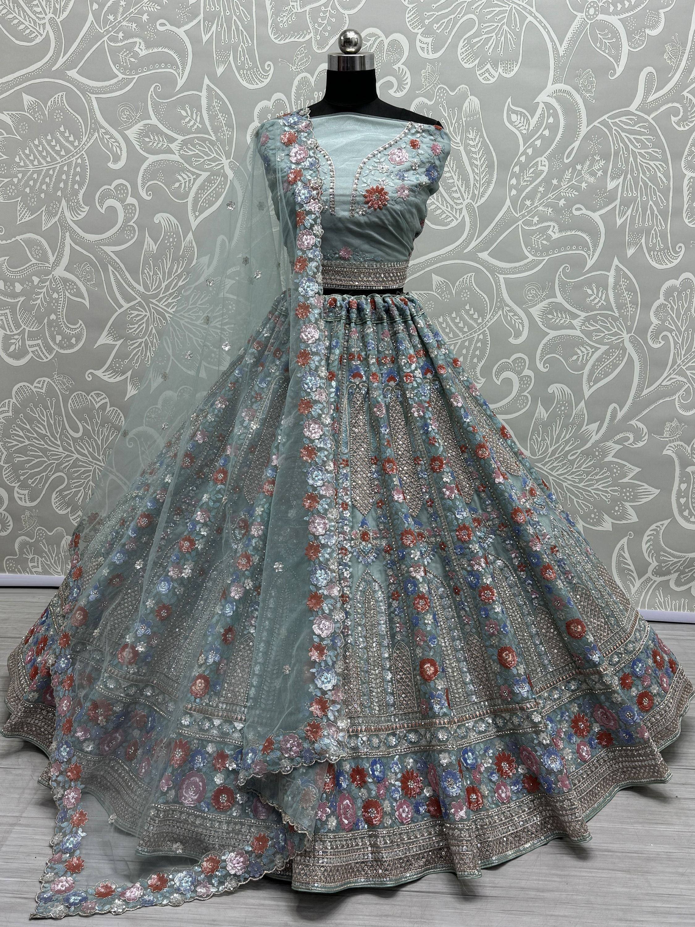 Light blue floral embroidered lehenga choli with sequin work, perfect for Indian weddings and festive occasions.