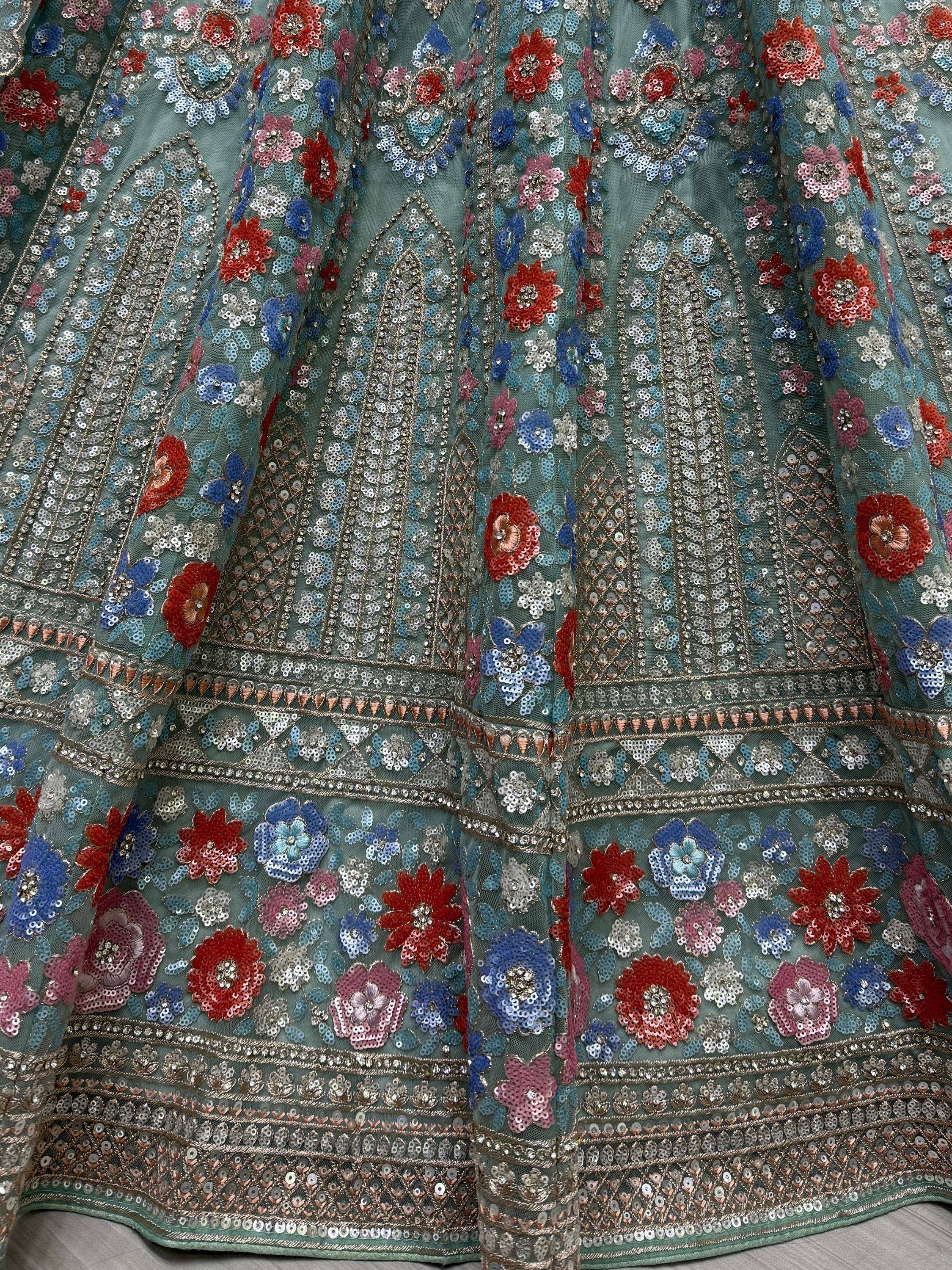 Teal lehenga skirt with floral sequin embroidery, perfect for Indian ethnic wear events.