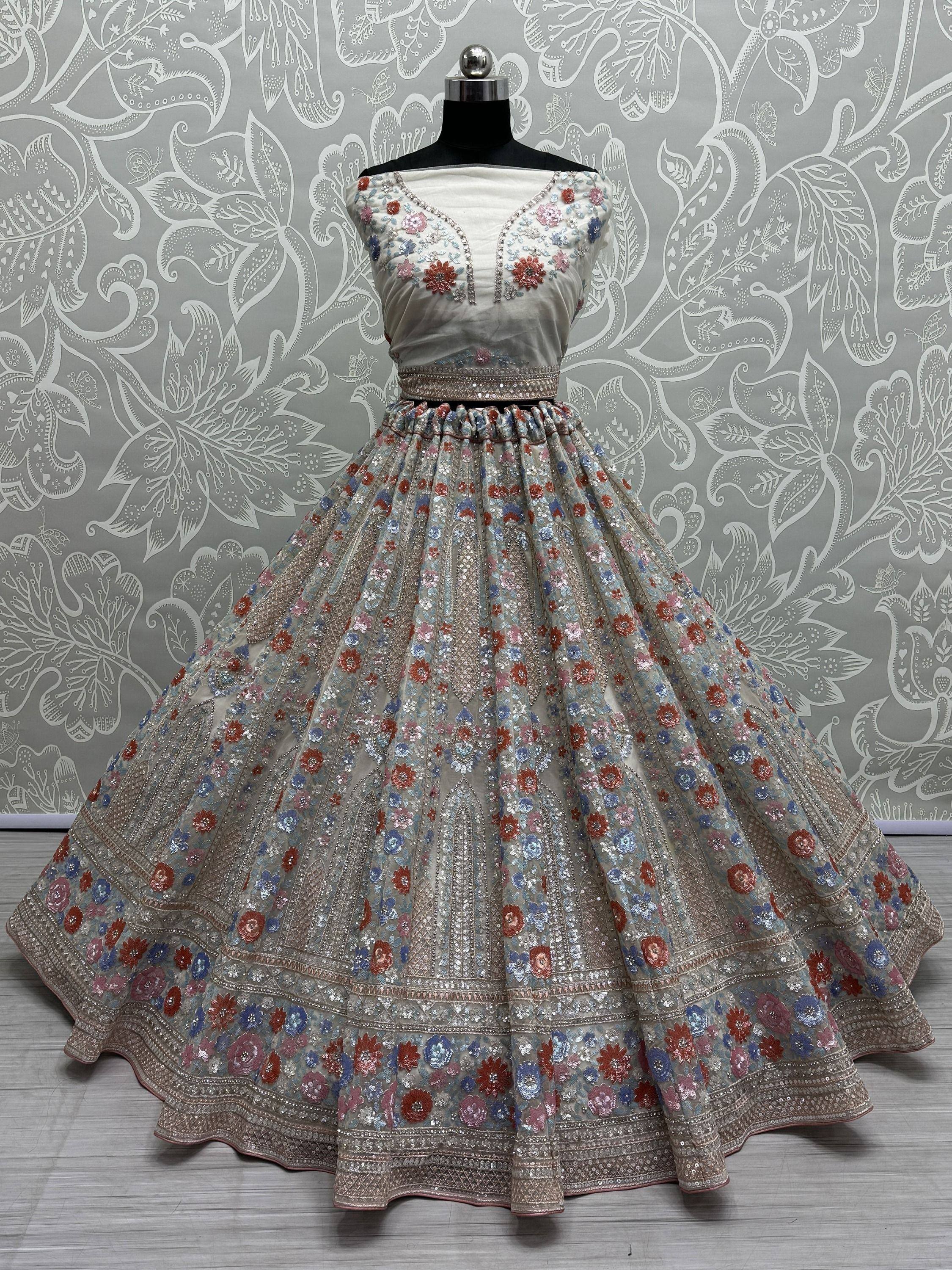 Designer lehenga choli with floral embroidery and sequins, perfect for Indian ethnic wear occasions.