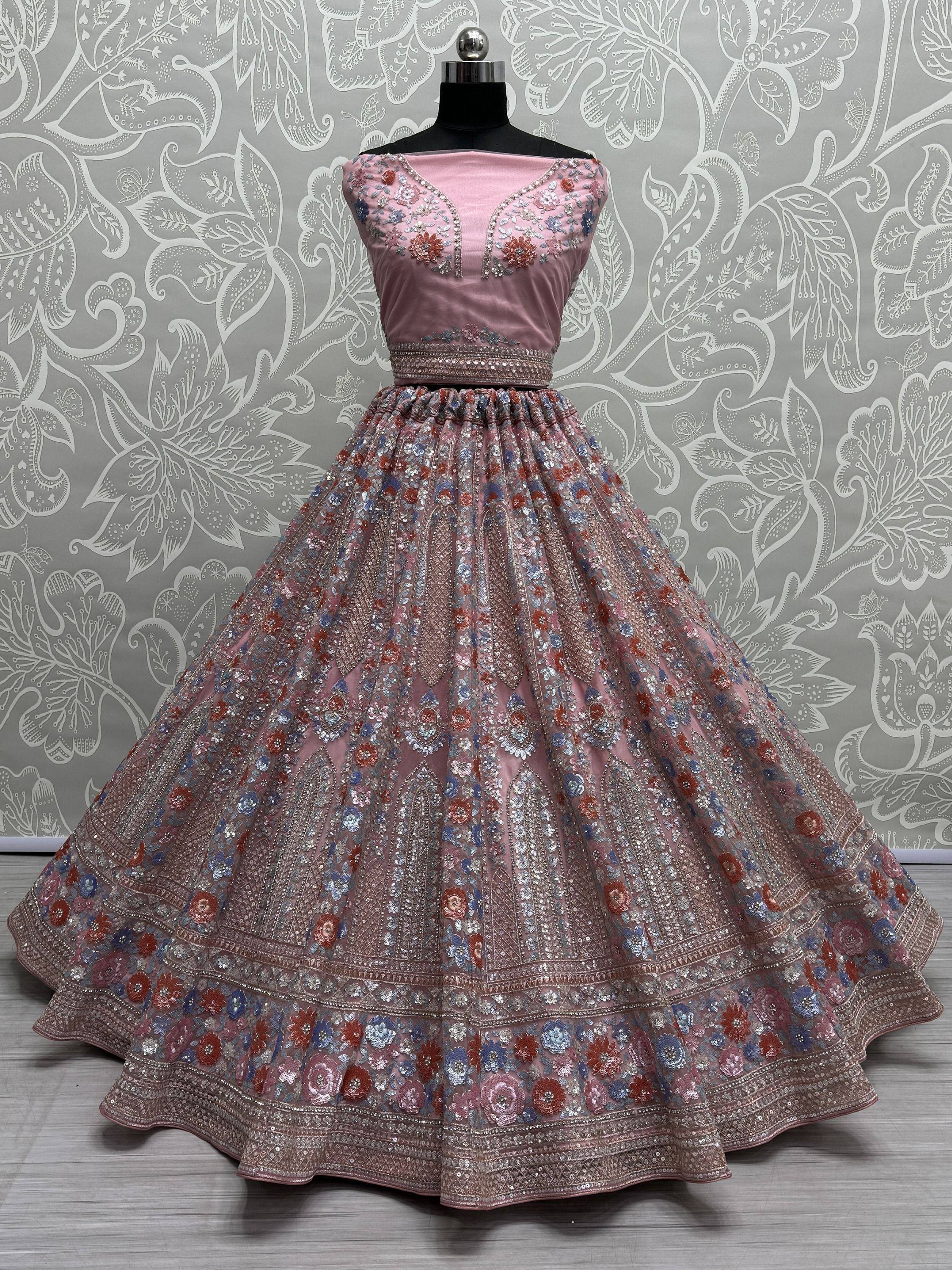 Pink designer lehenga choli with floral embroidery and sequin work, perfect for Indian ethnic occasions