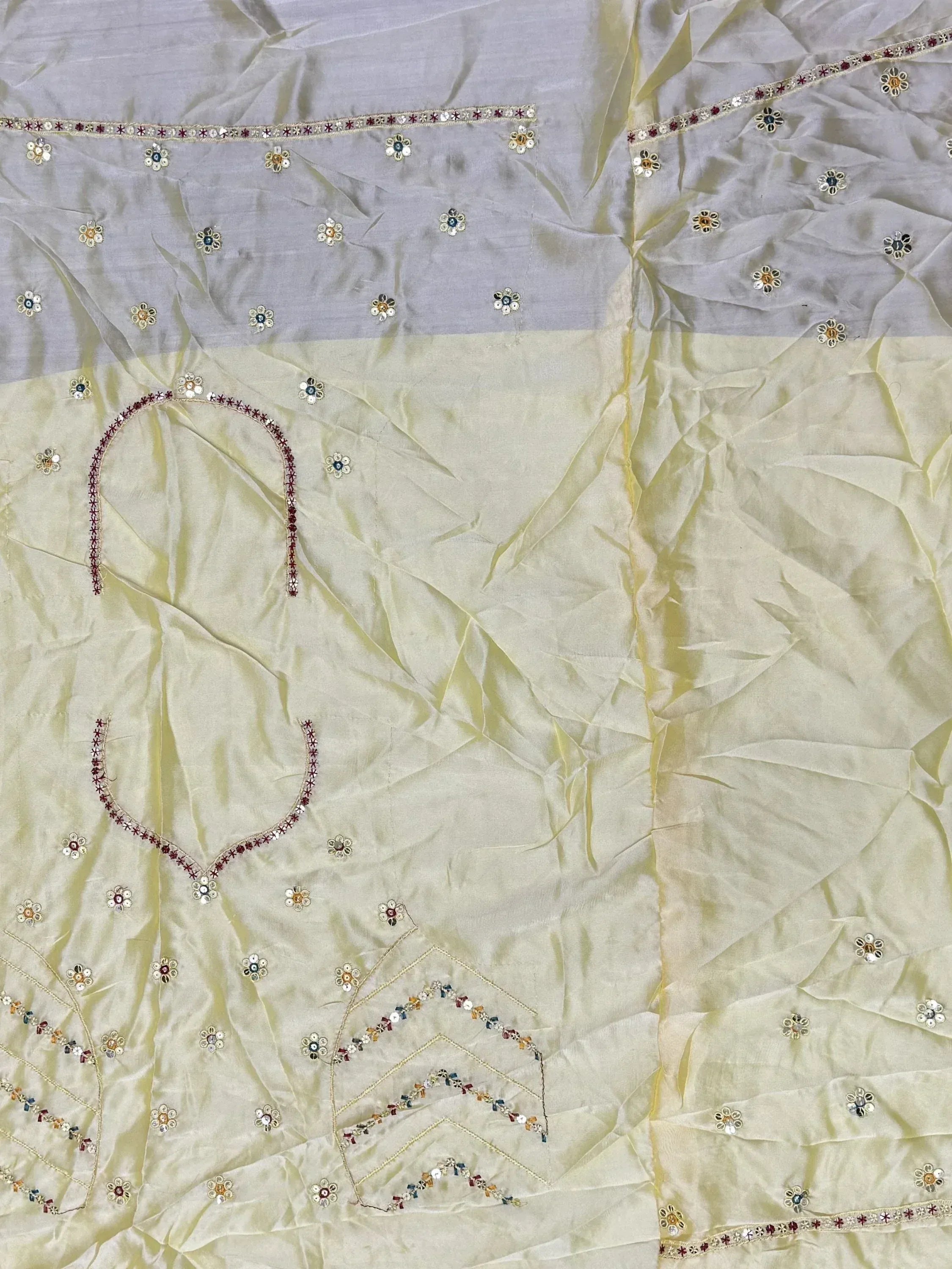 Light yellow and lavender ethnic wear with floral mirror embroidery and sequin detailing