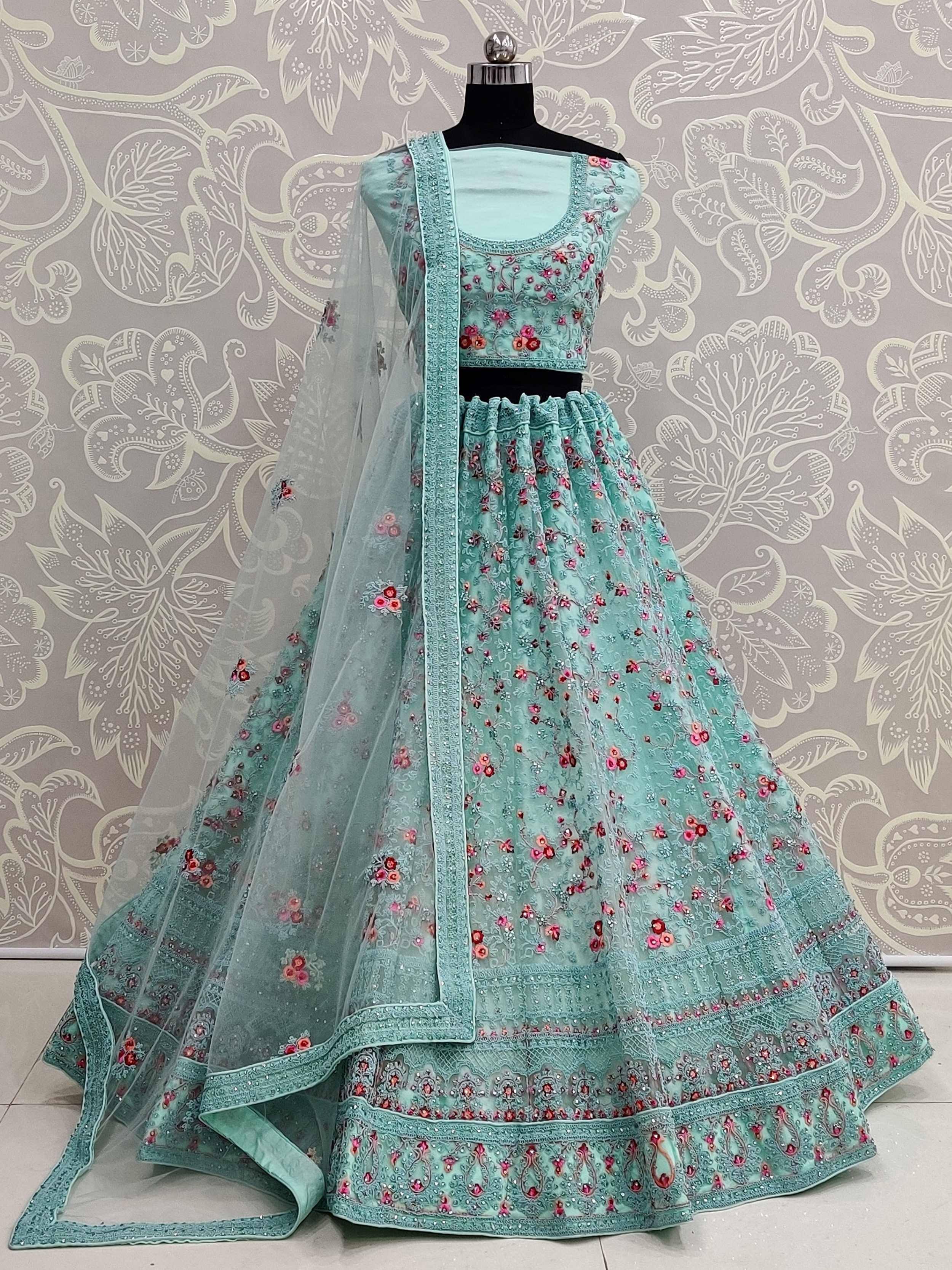 Mint green embroidered lehenga choli with floral detailing and sheer dupatta for Indian ethnic wear