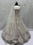 Dazzling White Multi-Thread Work Net Bridal Wear Lehenga Choli