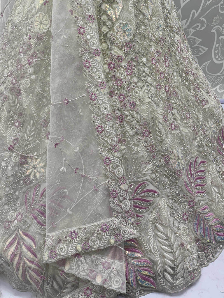 Dazzling White Multi-Thread Work Net Bridal Wear Lehenga Choli