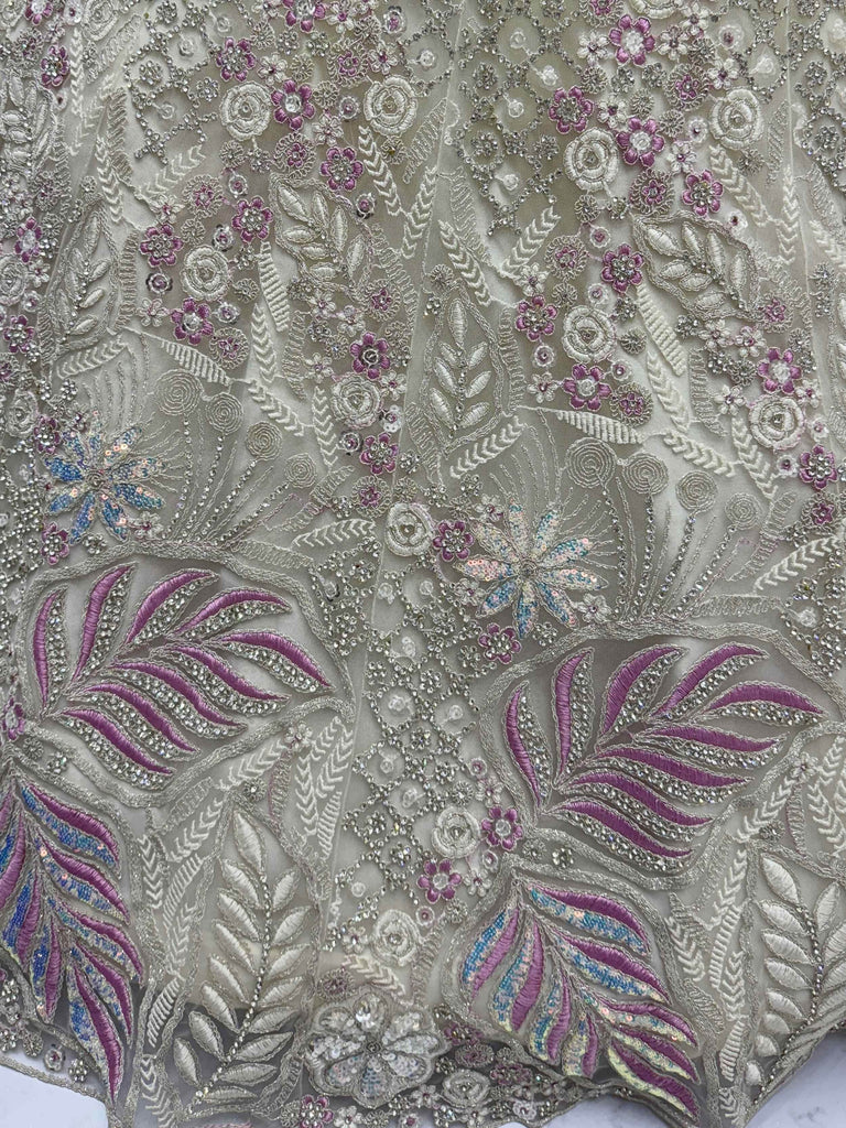 Dazzling White Multi-Thread Work Net Bridal Wear Lehenga Choli
