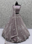 Alluring Purple Net Sequins Work Bridesmaid Lehenga Choli With Dupatta