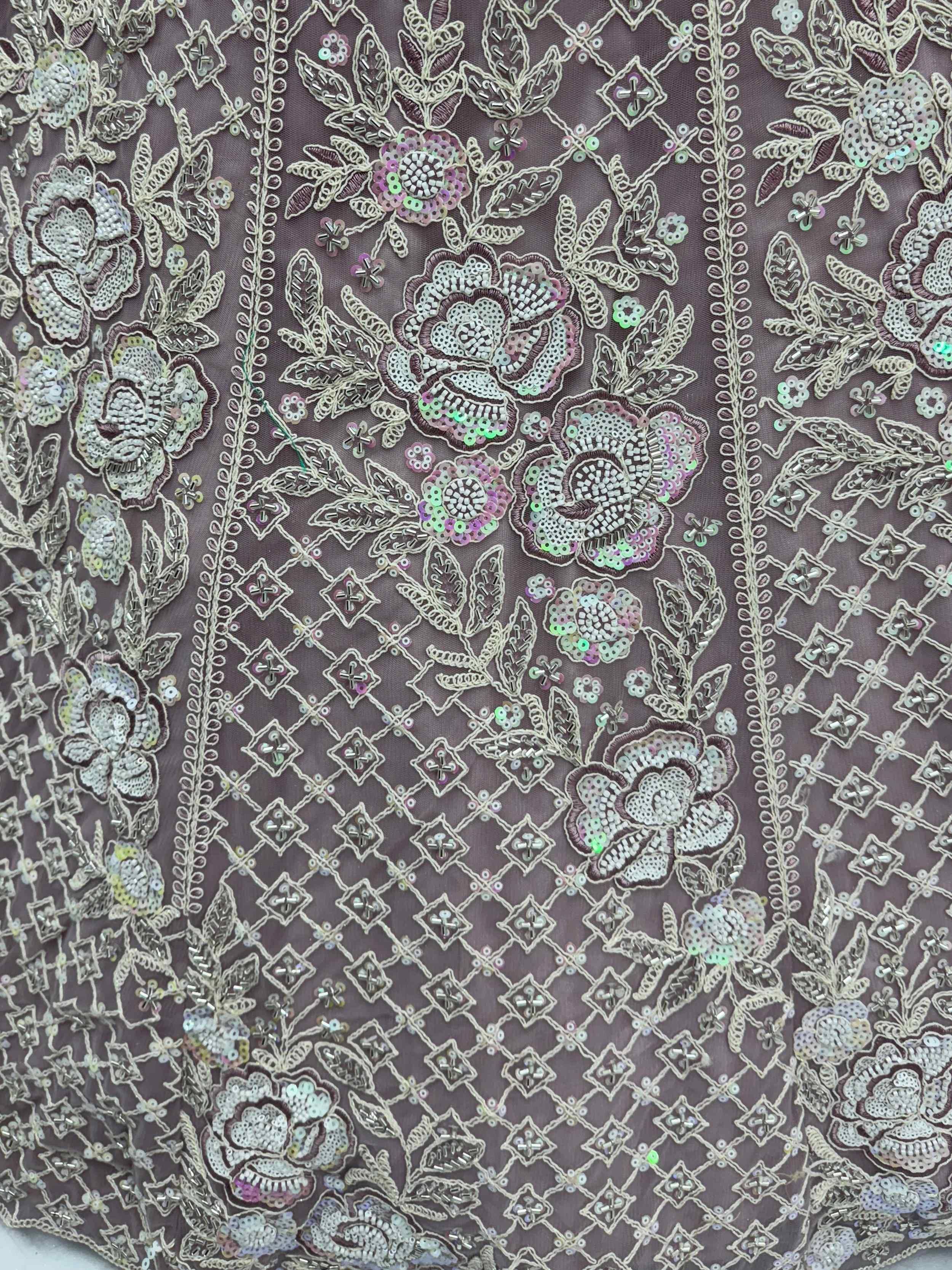 Elegant floral embroidery with sequins and beads on Indian ethnic wear fabric