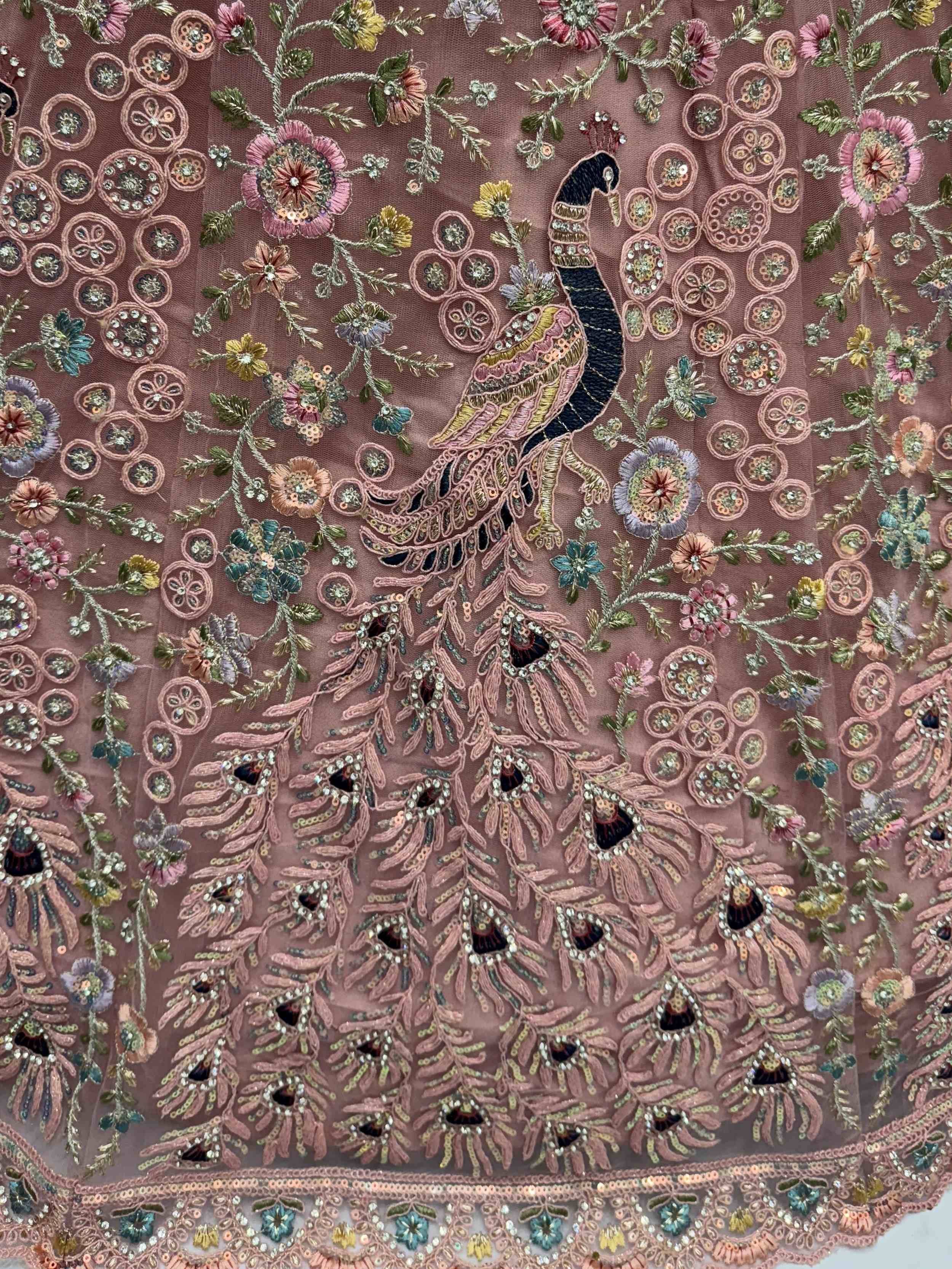 Peacock and floral embroidered ethnic wear fabric with sequins and threadwork