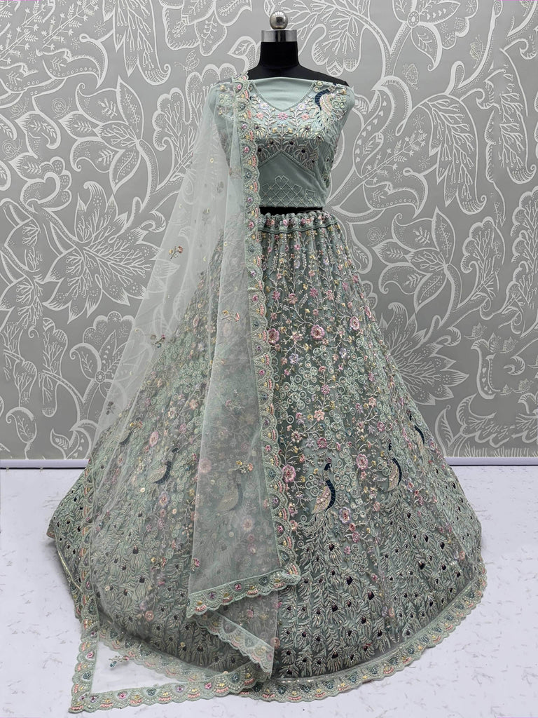 Dazzling Sky Blue Net Zari Embroidered Reception Wear Lehenga Choli