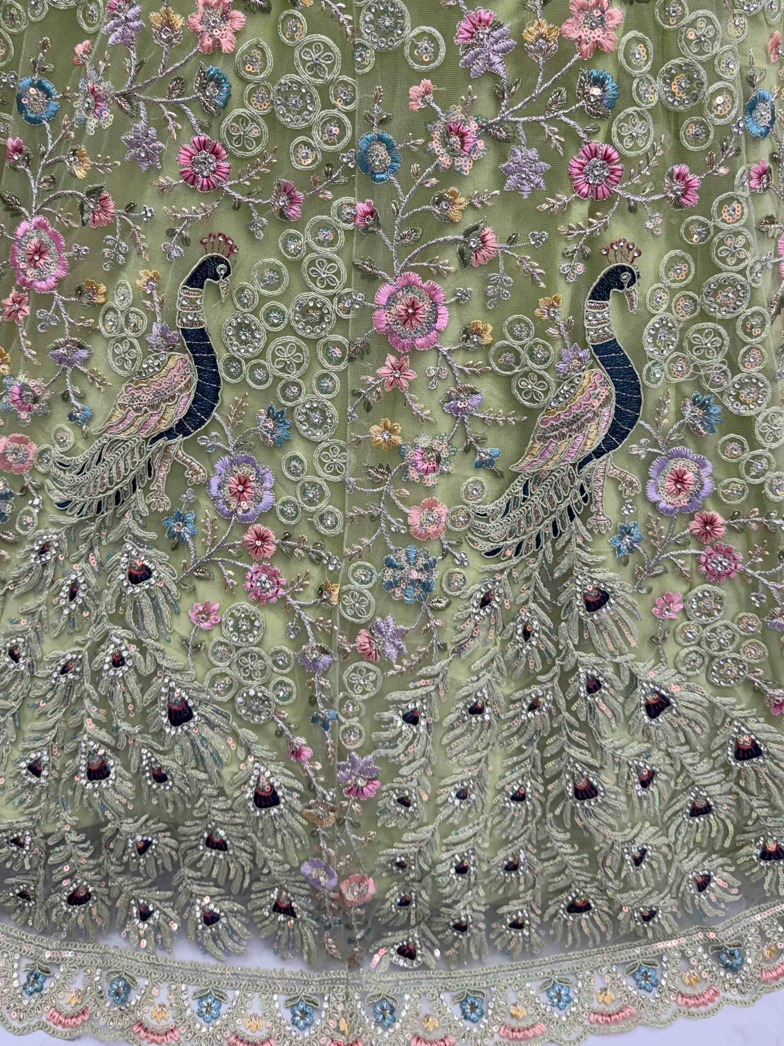 Olive green ethnic fabric with peacock and floral embroidery, perfect for designer lehenga or saree.