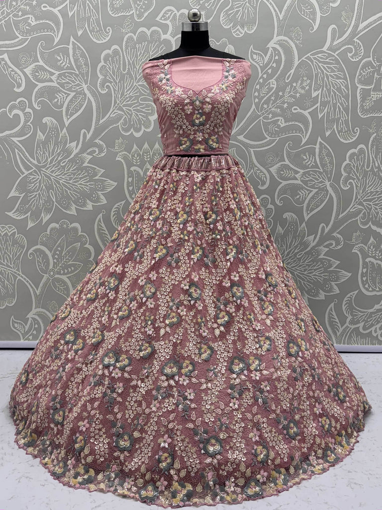 Tantalizing Pink Net Sequins Engagement Wear Lehenga Choli