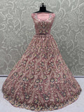 Tantalizing Pink Net Sequins Engagement Wear Lehenga Choli