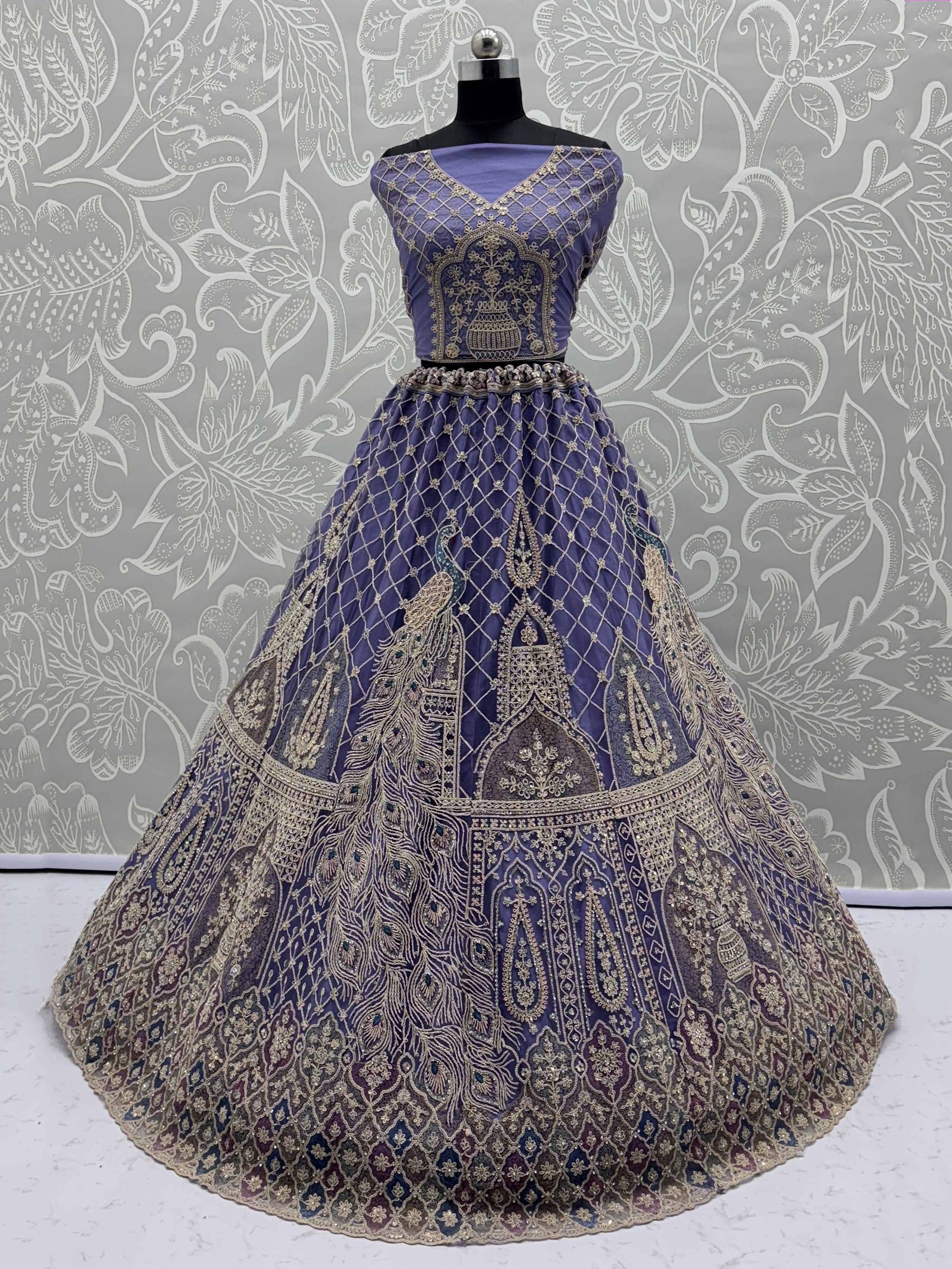 Purple designer lehenga choli with peacock embroidery and gold detailing, ethnic Indian wear