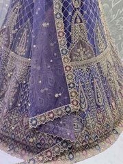 Elegant Purple Net Thread Embroidered Function Wear Lehenga Choli