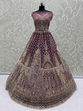 Graceful Mauve Net Zircon Work Bridesmaid Lehenga Choli With Dupatta