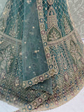 Tantalizing Blue Zari Embroidered Net Lehenga Choli With Dupatta