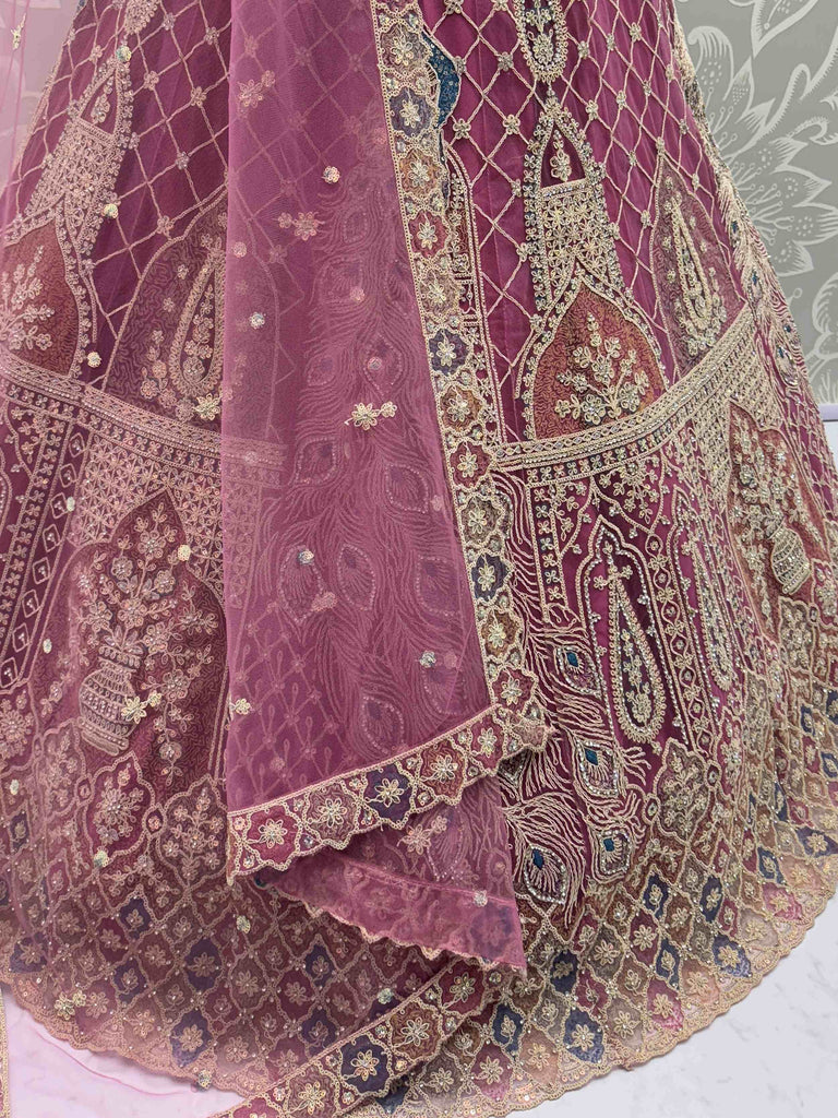 Enchanting Pink Net Sequins Engagement Wear Lehenga Choli With Dupatta
