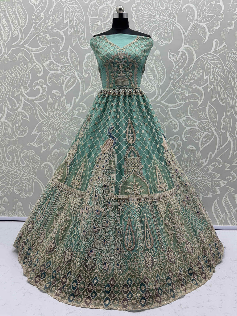 Mesmerizing Green Net Stone Work Reception Wear Lehenga Choli