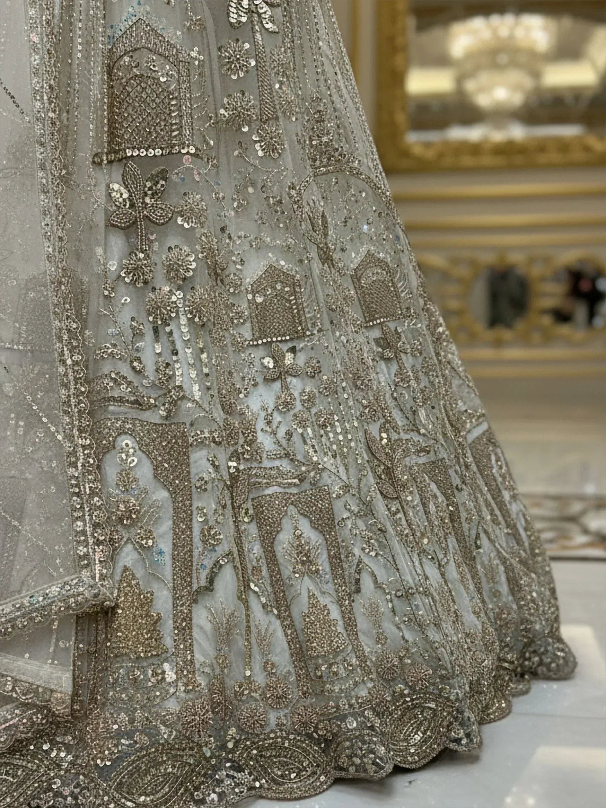 Elegant silver grey lehenga with intricate sequin and bead embroidery, perfect for Indian weddings and festive occasions.